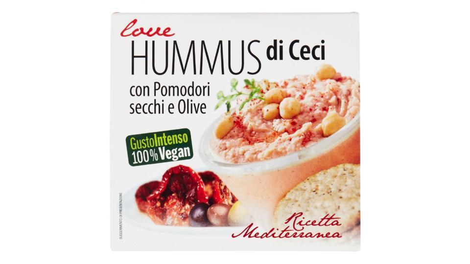 Hummus di ceci con pomodori secchi e olive